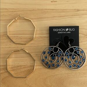 2 pairs of earrings. Big dangly bohemian things. And big geometric hoops